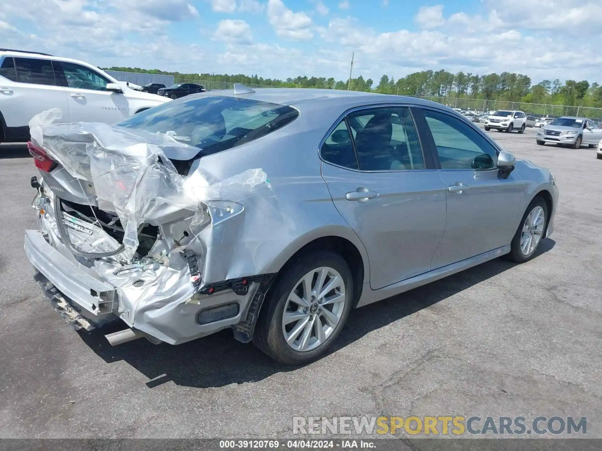 4 Photograph of a damaged car 4T1C11AK6PU724306 TOYOTA CAMRY 2023