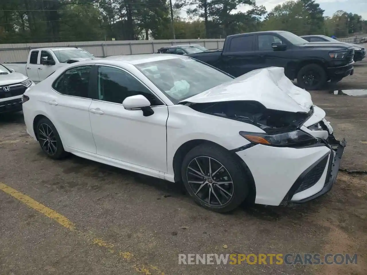 4 Photograph of a damaged car 4T1G11AK1PU188298 TOYOTA CAMRY 2023