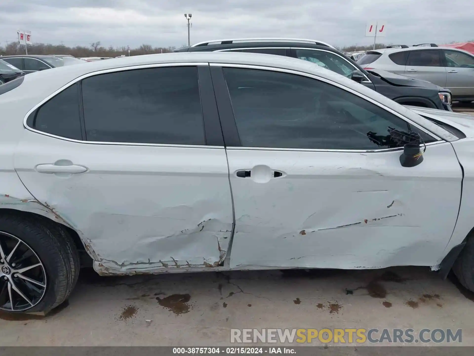 14 Photograph of a damaged car 4T1G11AK3PU124960 TOYOTA CAMRY 2023