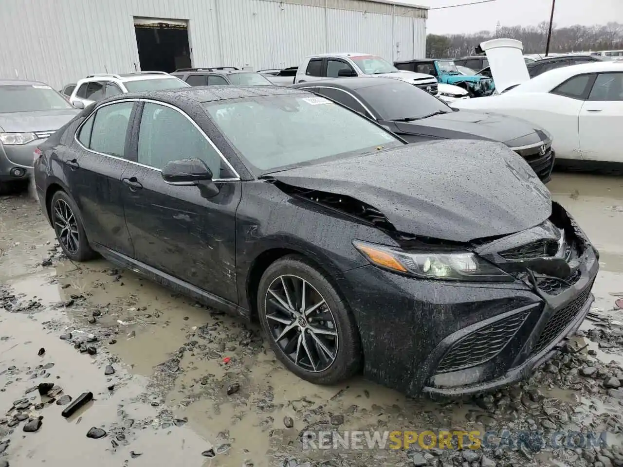 4 Photograph of a damaged car 4T1G11AK6PU817733 TOYOTA CAMRY 2023