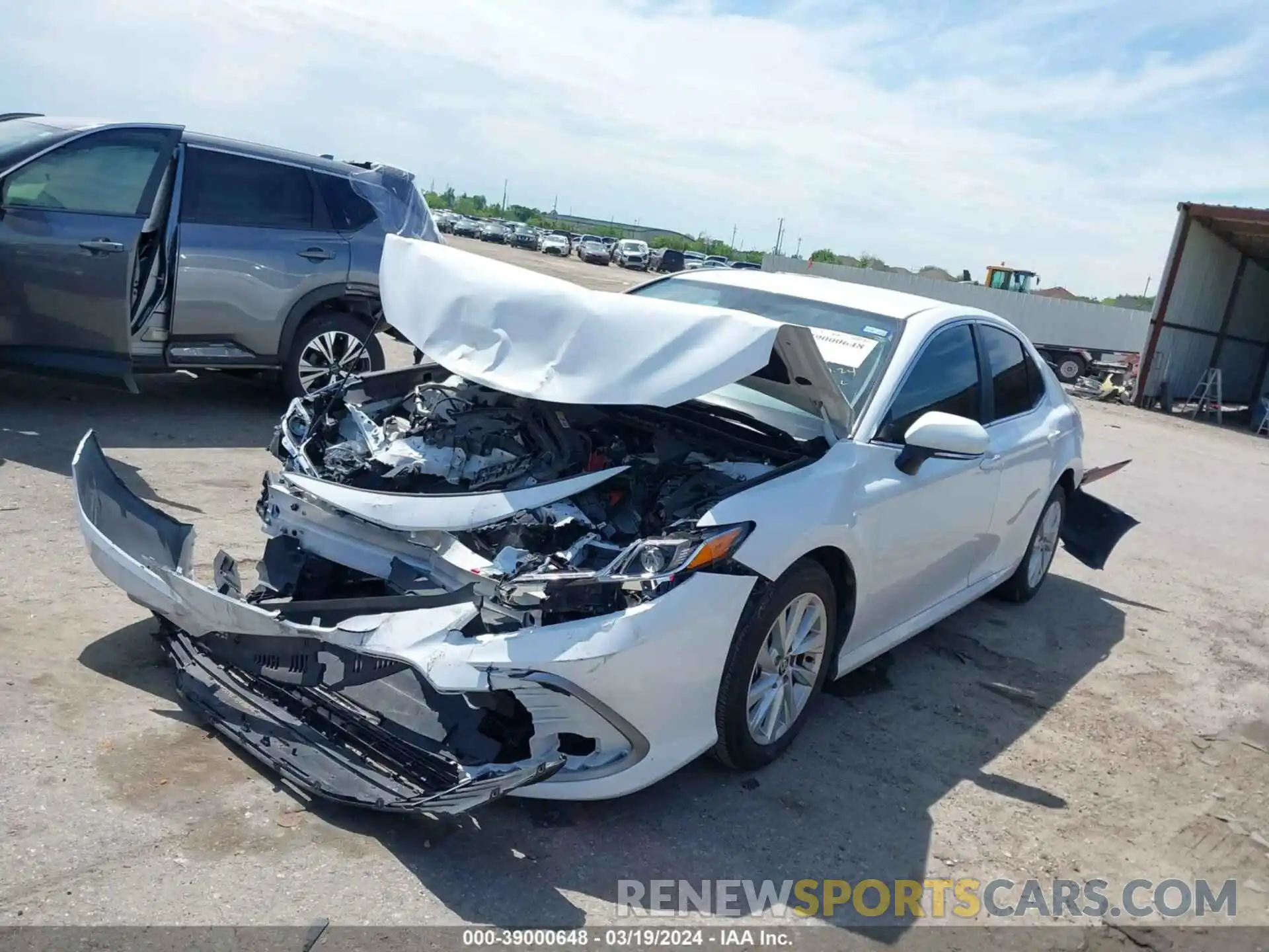 2 Photograph of a damaged car 4T1R11AK8PU807407 TOYOTA CAMRY 2023