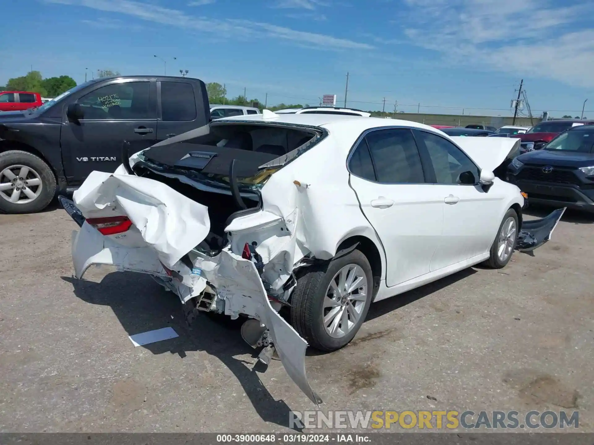 4 Photograph of a damaged car 4T1R11AK8PU807407 TOYOTA CAMRY 2023