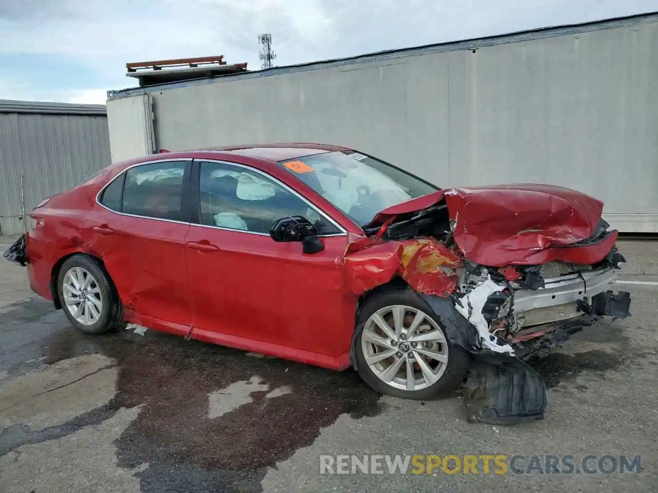 4 Photograph of a damaged car 4T1R11AK9PU137494 TOYOTA CAMRY 2023