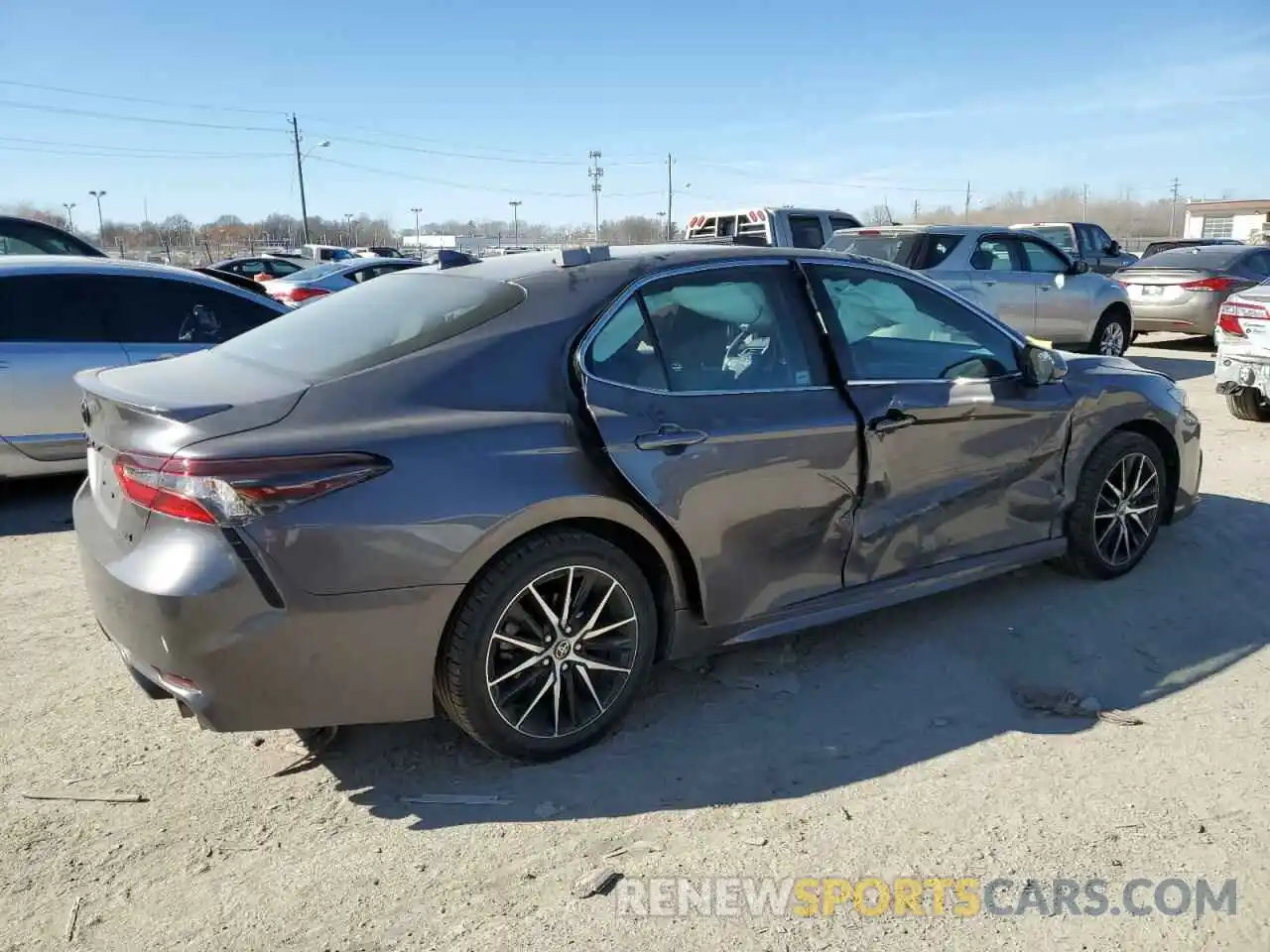 3 Photograph of a damaged car 4T1T11AK0PU767118 TOYOTA CAMRY 2023