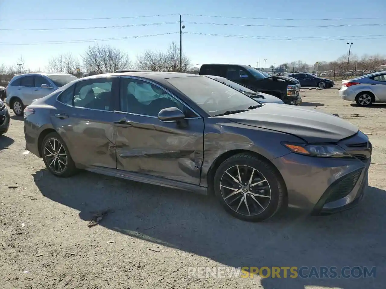 4 Photograph of a damaged car 4T1T11AK0PU767118 TOYOTA CAMRY 2023