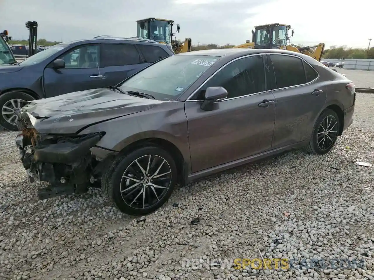 1 Photograph of a damaged car 4T1T11AK1PU780914 TOYOTA CAMRY 2023