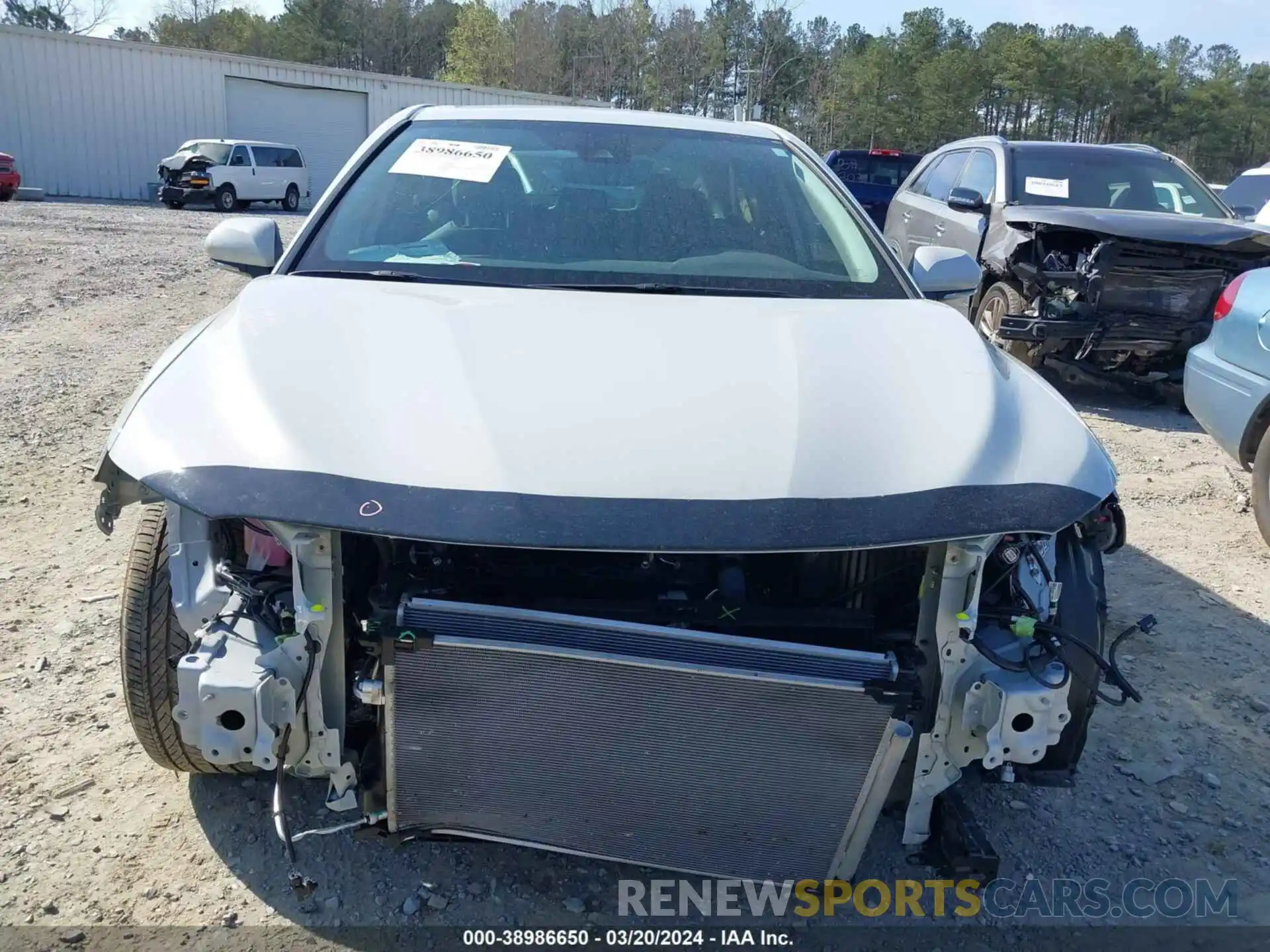 12 Photograph of a damaged car 4T1T11AK6PU142531 TOYOTA CAMRY 2023