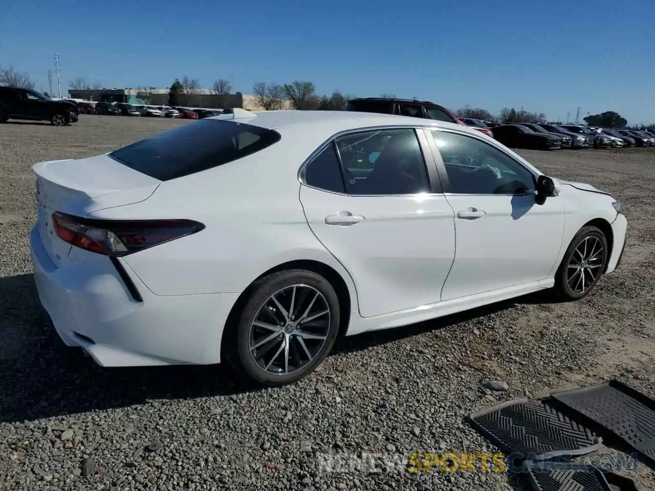 3 Photograph of a damaged car 4T1T11AK6PU823580 TOYOTA CAMRY 2023