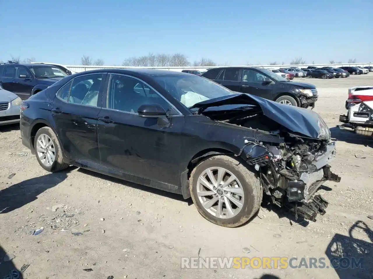 4 Photograph of a damaged car 4T1C11AK1RU189789 TOYOTA CAMRY 2024