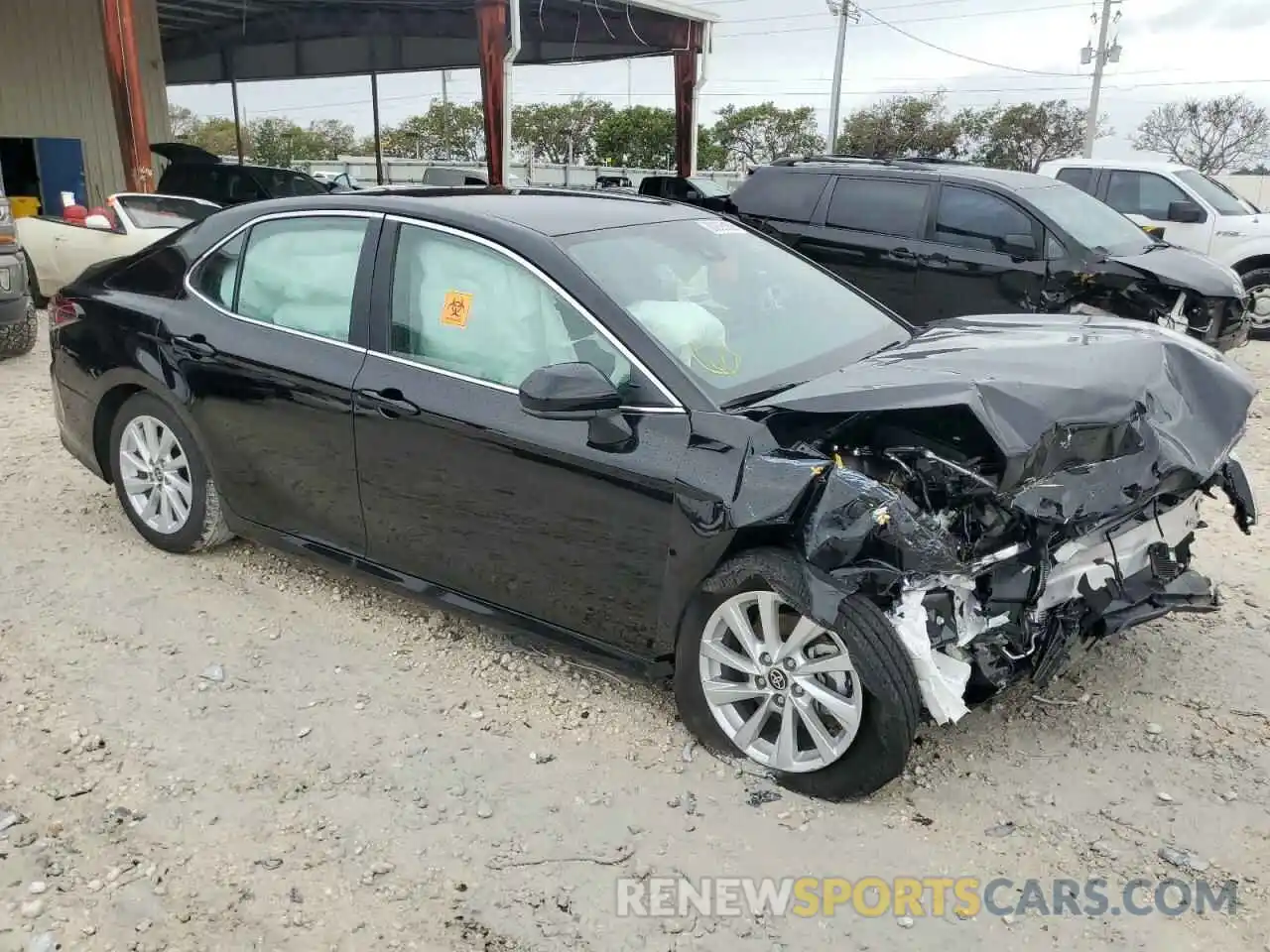 4 Photograph of a damaged car 4T1C11AK7RU873925 TOYOTA CAMRY 2024