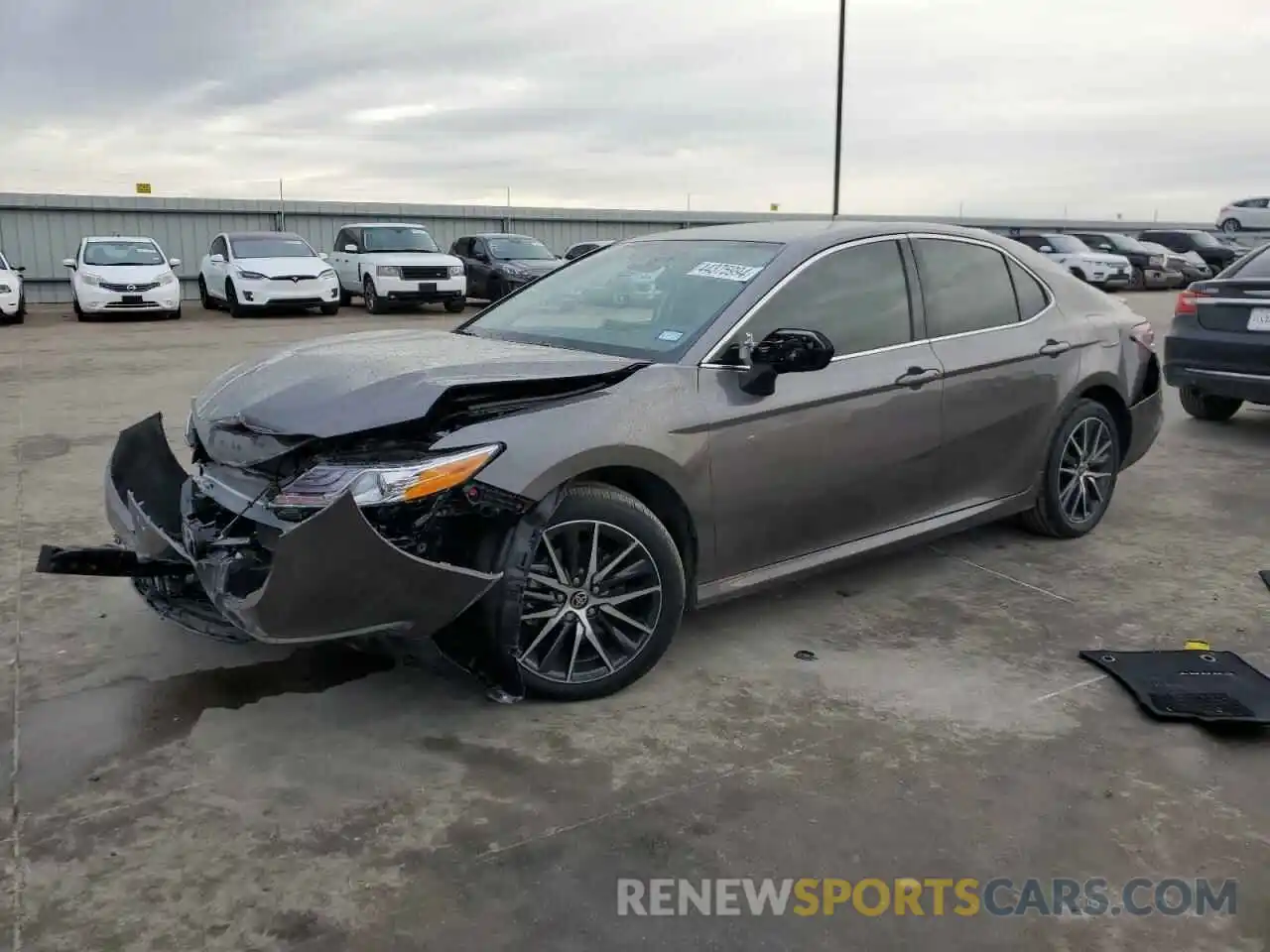 1 Photograph of a damaged car 4T1F11AKXRU879814 TOYOTA CAMRY 2024