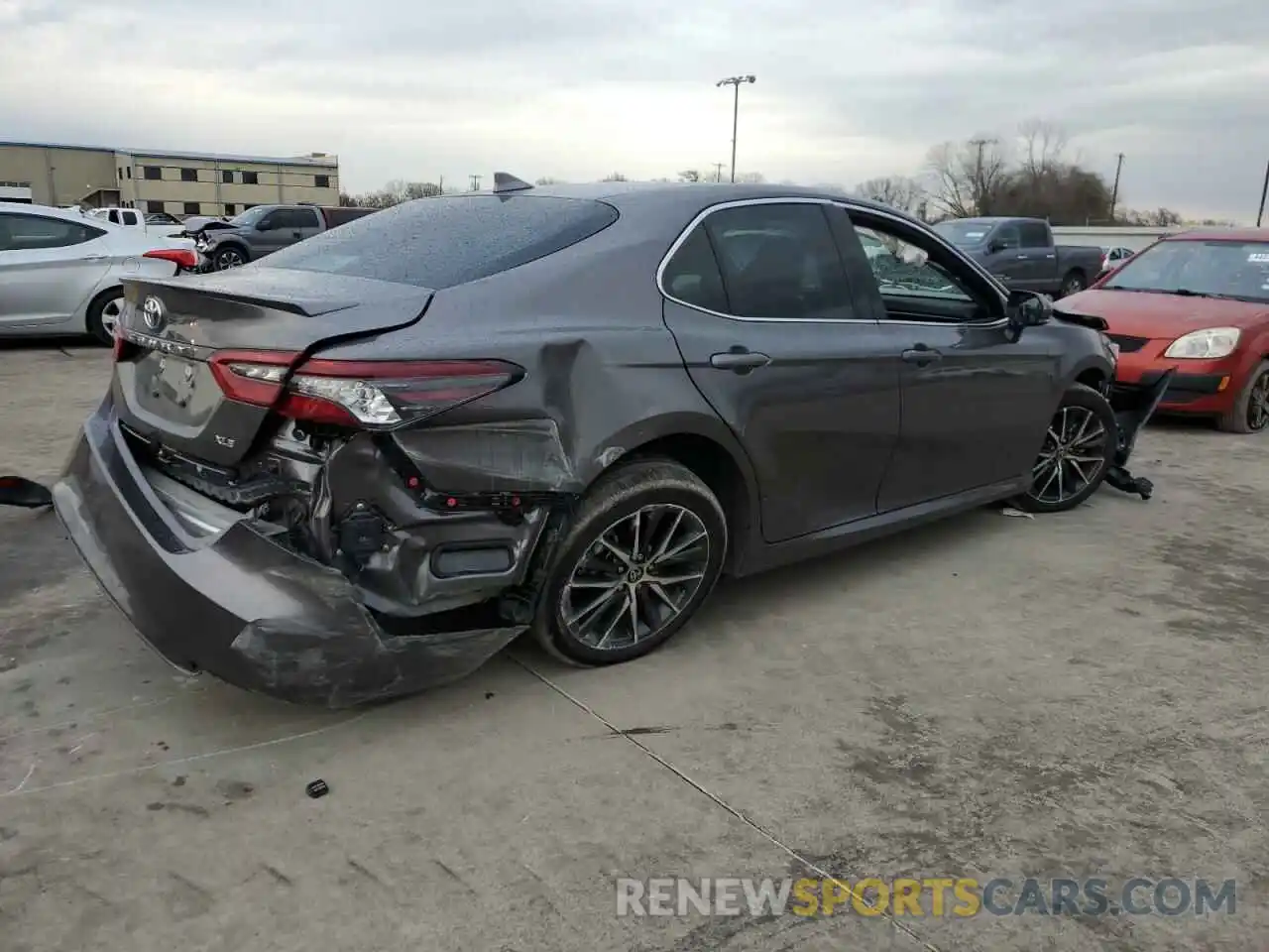 3 Photograph of a damaged car 4T1F11AKXRU879814 TOYOTA CAMRY 2024