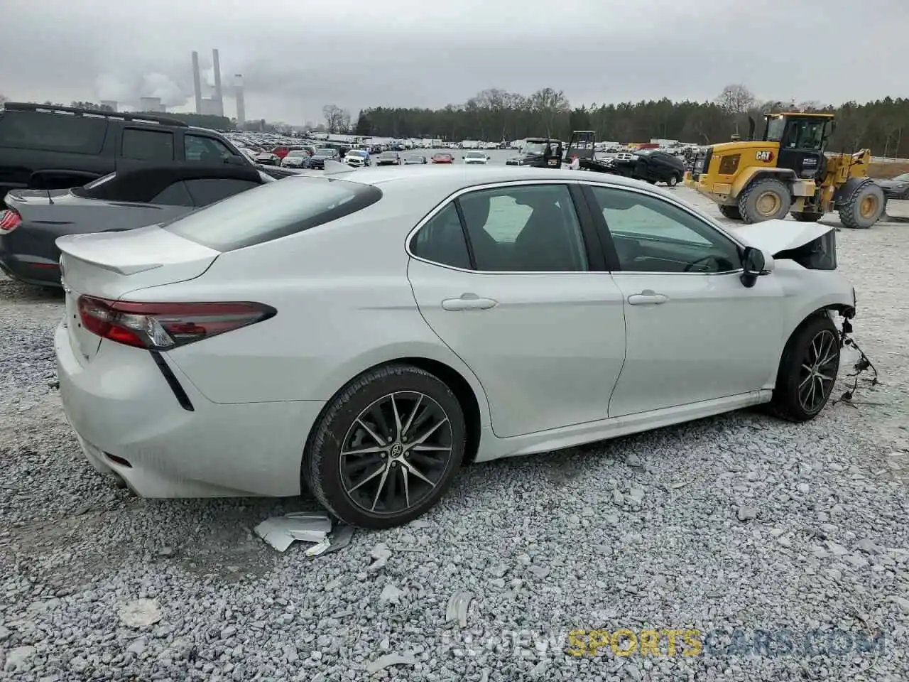 3 Photograph of a damaged car 4T1G11AK2RU202860 TOYOTA CAMRY 2024