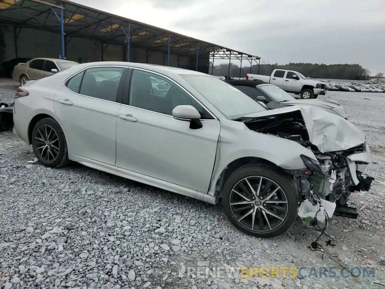 4 Photograph of a damaged car 4T1G11AK2RU202860 TOYOTA CAMRY 2024