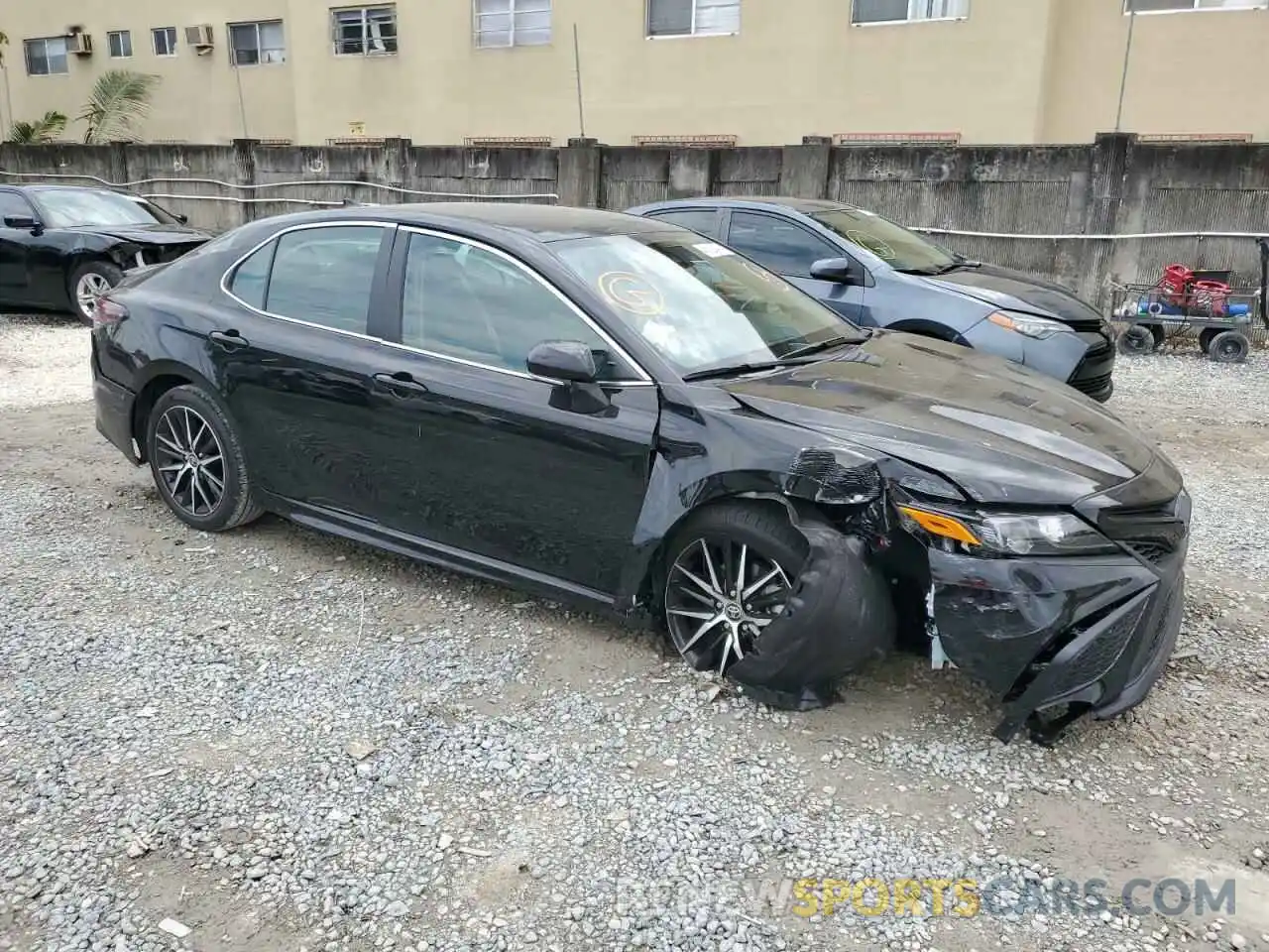 4 Photograph of a damaged car 4T1G11AKXRU887786 TOYOTA CAMRY 2024