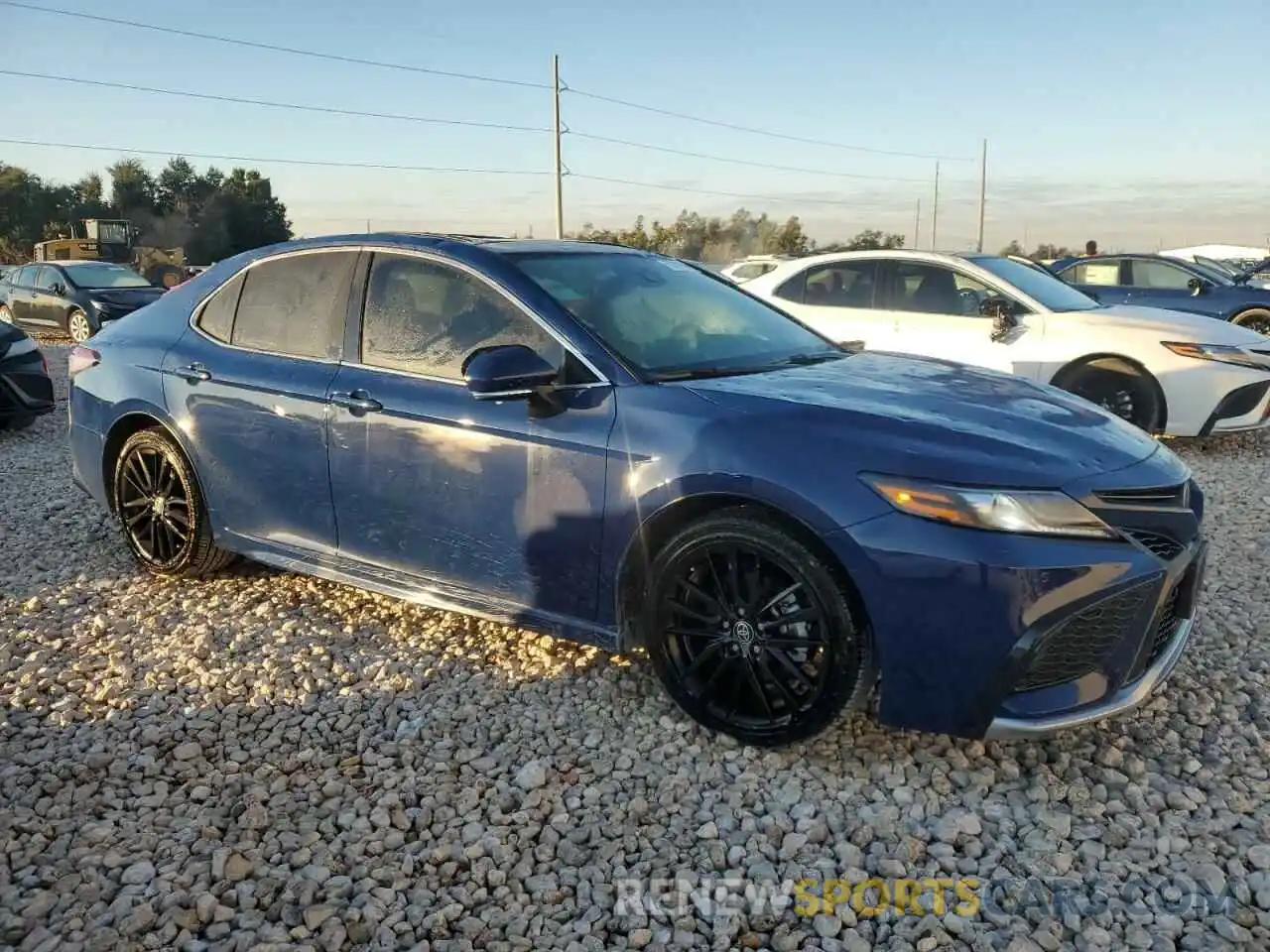 4 Photograph of a damaged car 4T1KZ1AK8RU089029 TOYOTA CAMRY 2024