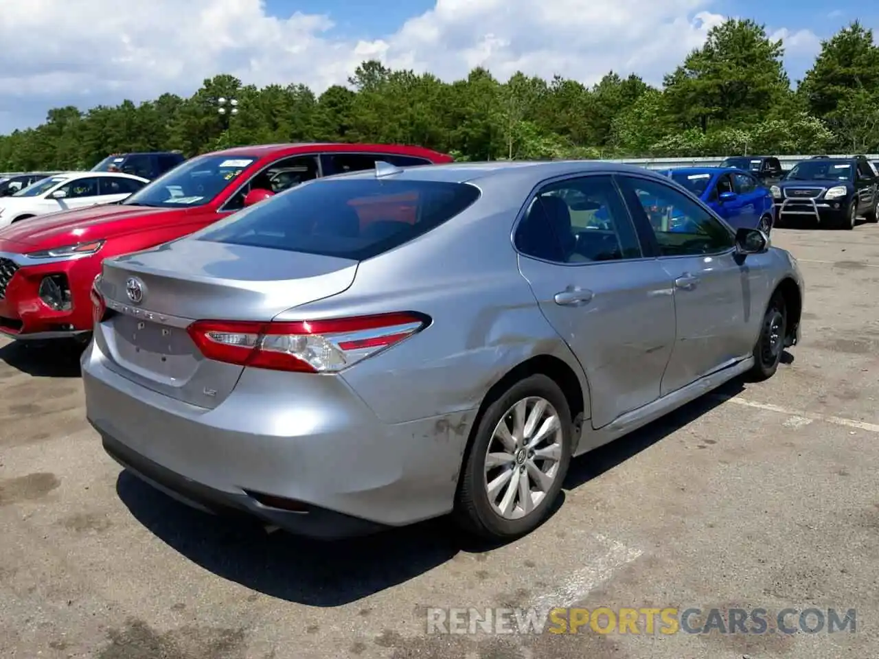 4 Photograph of a damaged car 4T1B11HKXKU731690 TOYOTA CAMRY 4C 2019