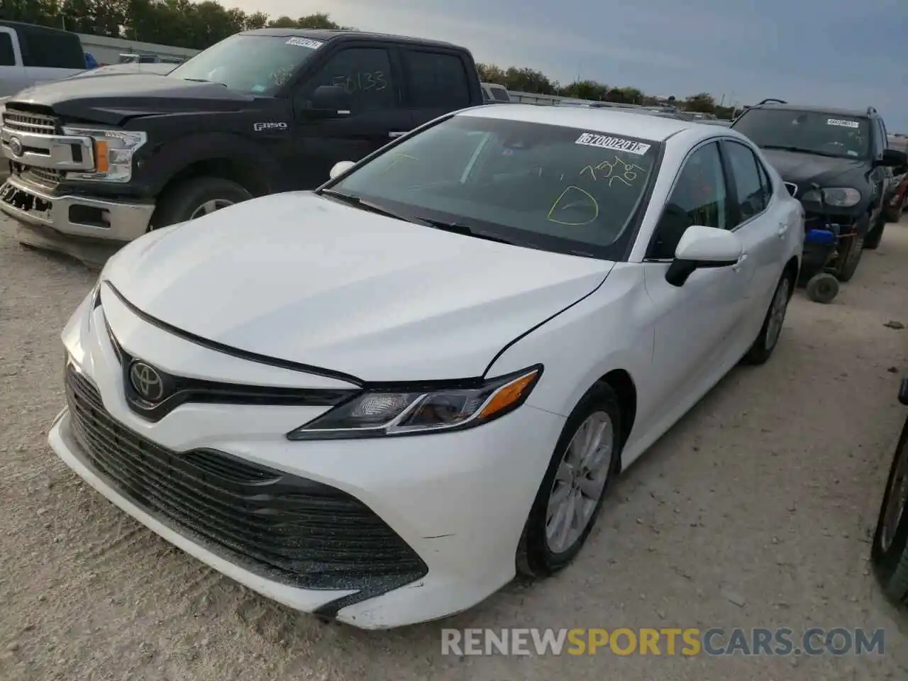 2 Photograph of a damaged car 4T1B11HKXKU754709 TOYOTA CAMRY 4C 2019