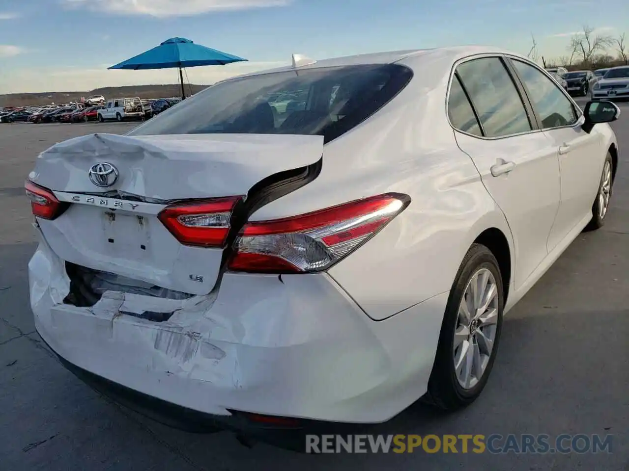 4 Photograph of a damaged car 4T1B11HKXKU774779 TOYOTA CAMRY 4C 2019