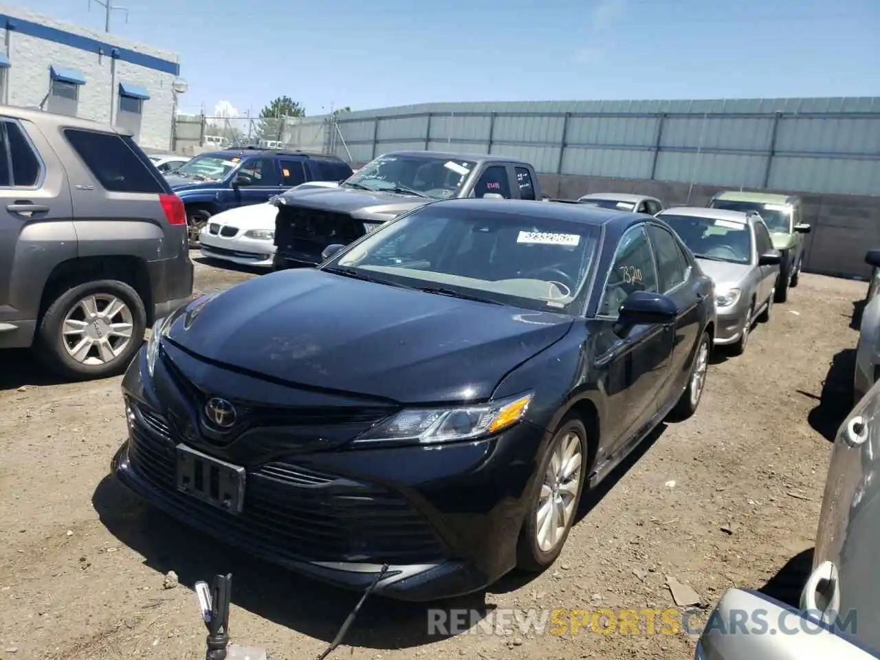 2 Photograph of a damaged car 4T1B11HKXKU784454 TOYOTA CAMRY 4C 2019