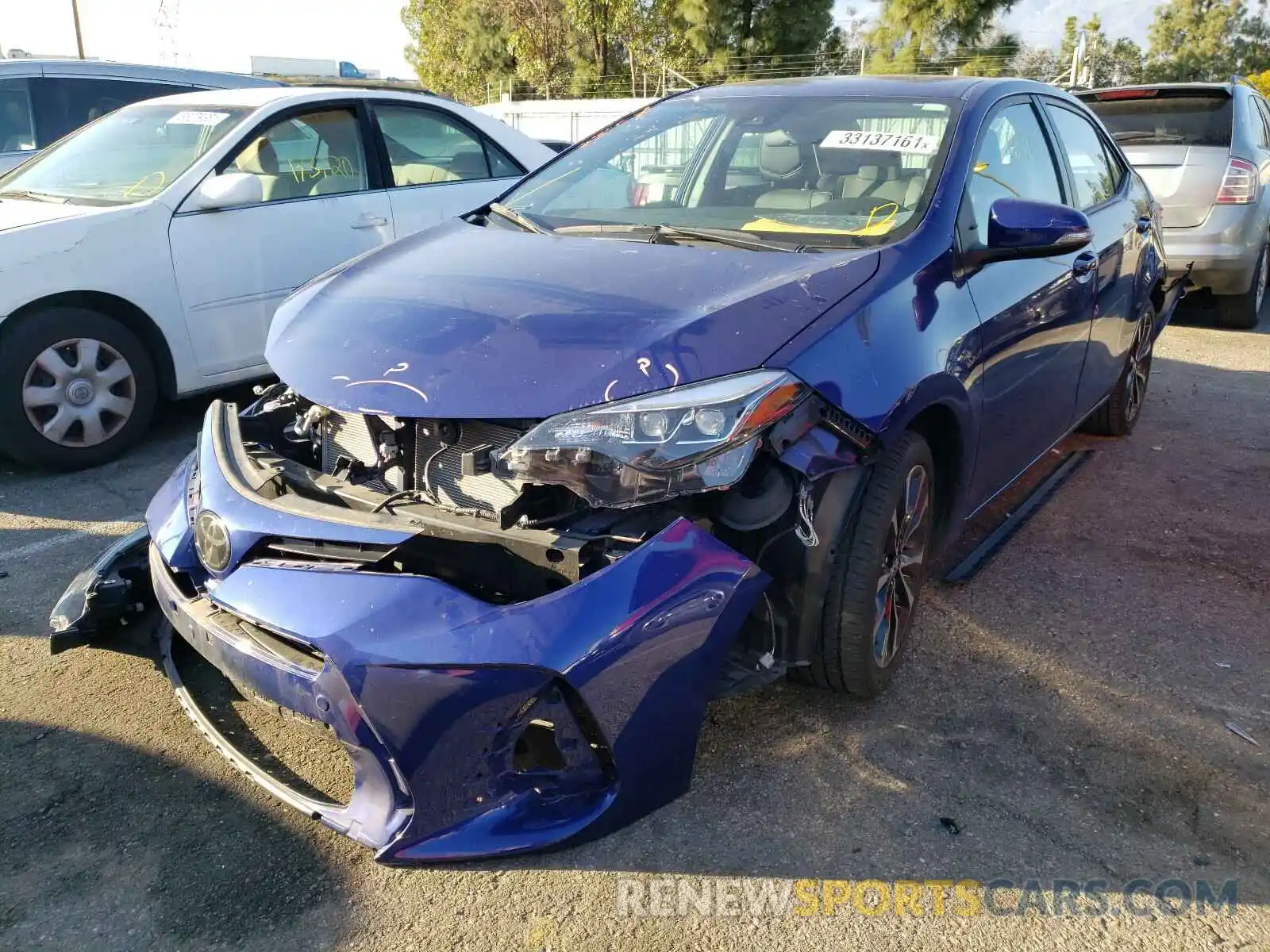 2 Фотография поврежденного автомобиля 2T1BURHE2KC159418 TOYOTA COROLLA 2019