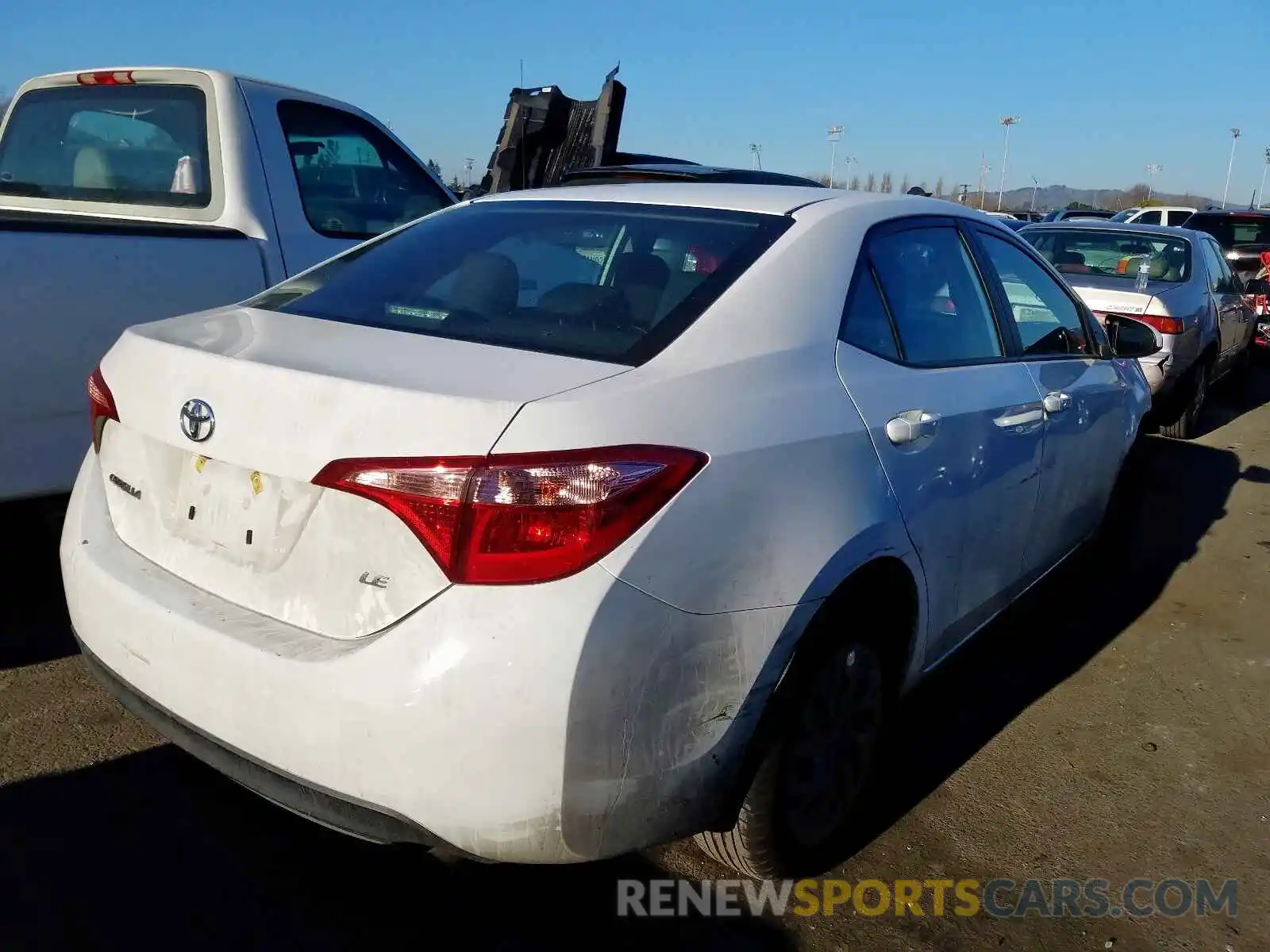 4 Photograph of a damaged car 2T1BURHE4KC142085 TOYOTA COROLLA 2019