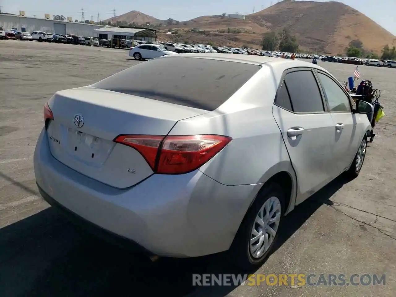 4 Photograph of a damaged car 5YFBURHE0KP859972 TOYOTA COROLLA 2019