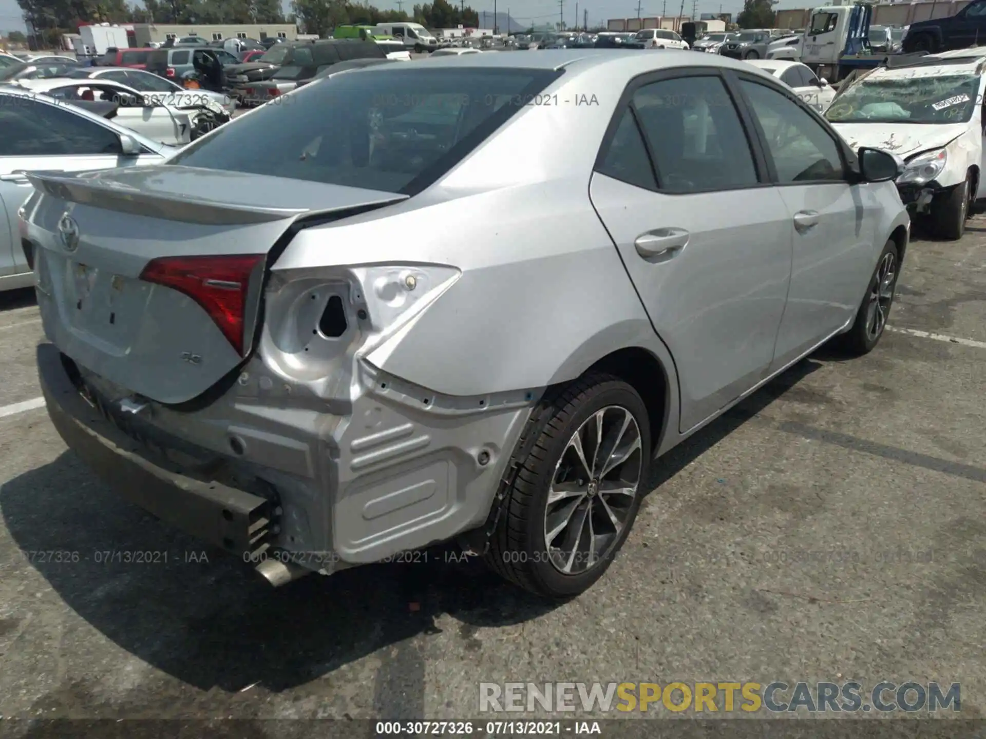 4 Photograph of a damaged car 5YFBURHE0KP870034 TOYOTA COROLLA 2019