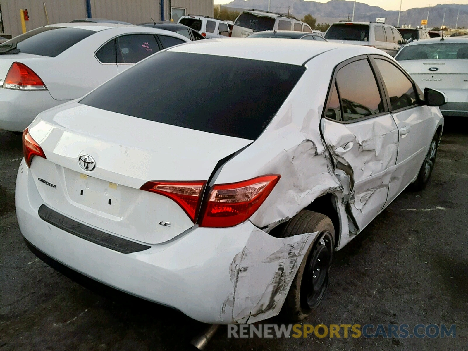 4 Photograph of a damaged car 5YFBURHE0KP879560 TOYOTA COROLLA 2019