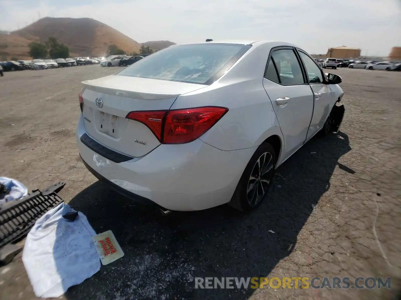 4 Photograph of a damaged car 5YFBURHE0KP887142 TOYOTA COROLLA 2019