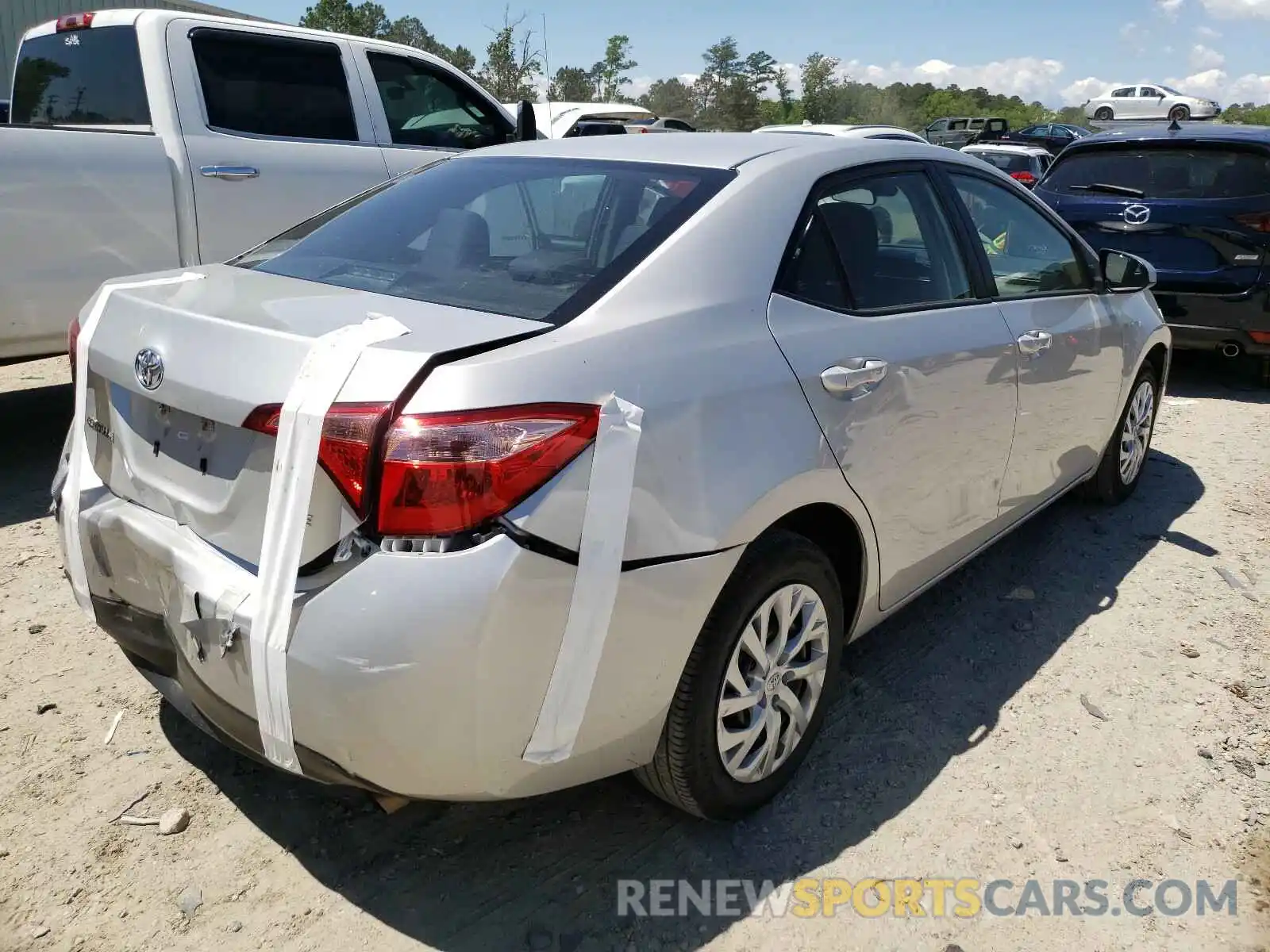 4 Photograph of a damaged car 5YFBURHE0KP889361 TOYOTA COROLLA 2019