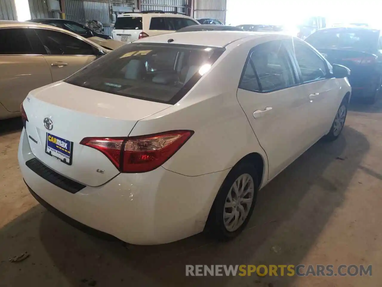 4 Photograph of a damaged car 5YFBURHE0KP890977 TOYOTA COROLLA 2019