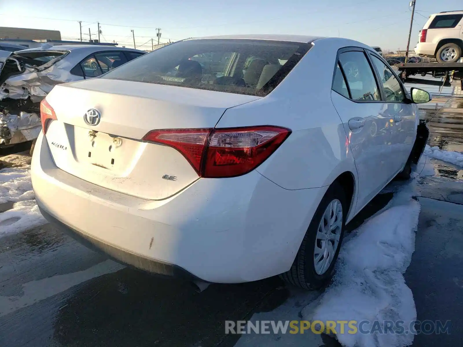 4 Photograph of a damaged car 5YFBURHE0KP897203 TOYOTA COROLLA 2019