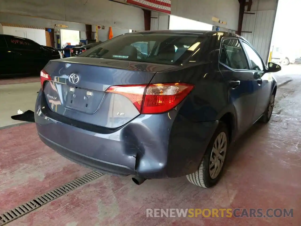 4 Photograph of a damaged car 5YFBURHE0KP897878 TOYOTA COROLLA 2019