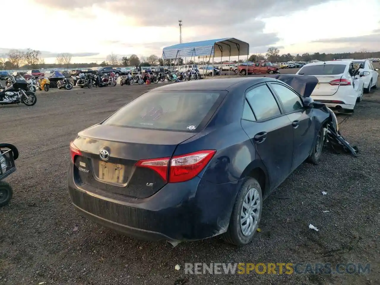 4 Photograph of a damaged car 5YFBURHE0KP909656 TOYOTA COROLLA 2019