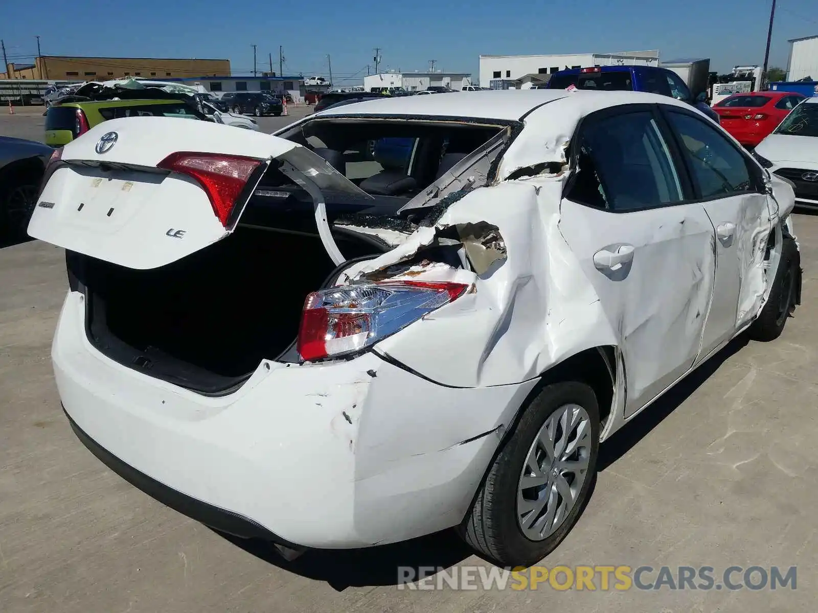 4 Photograph of a damaged car 5YFBURHE0KP940390 TOYOTA COROLLA 2019