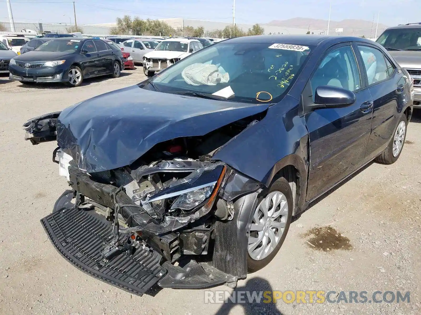 2 Photograph of a damaged car 5YFBURHE1KP862136 TOYOTA COROLLA 2019