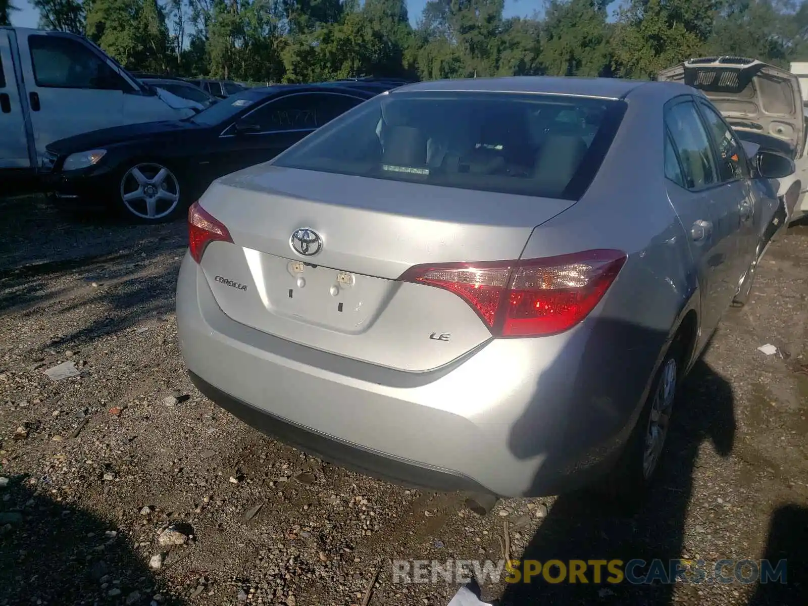 4 Photograph of a damaged car 5YFBURHE1KP897601 TOYOTA COROLLA 2019