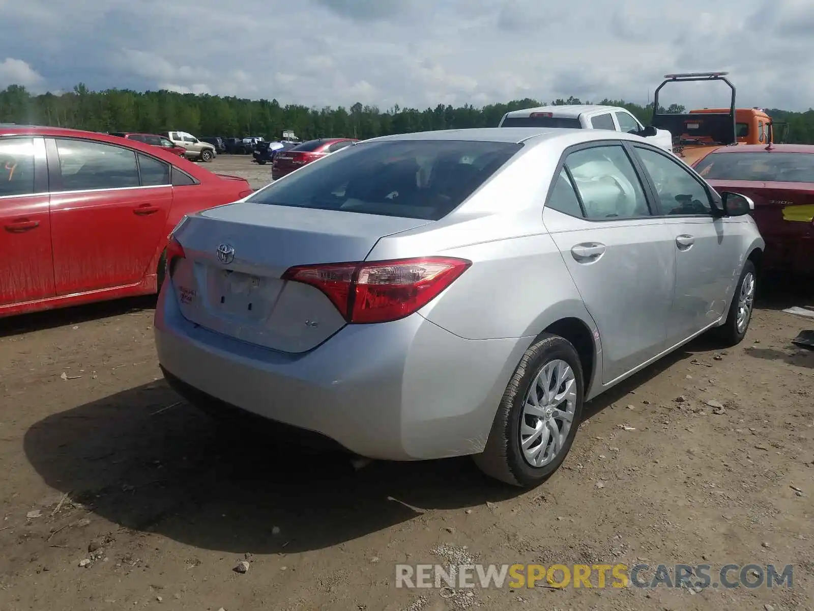 4 Photograph of a damaged car 5YFBURHE1KP900299 TOYOTA COROLLA 2019