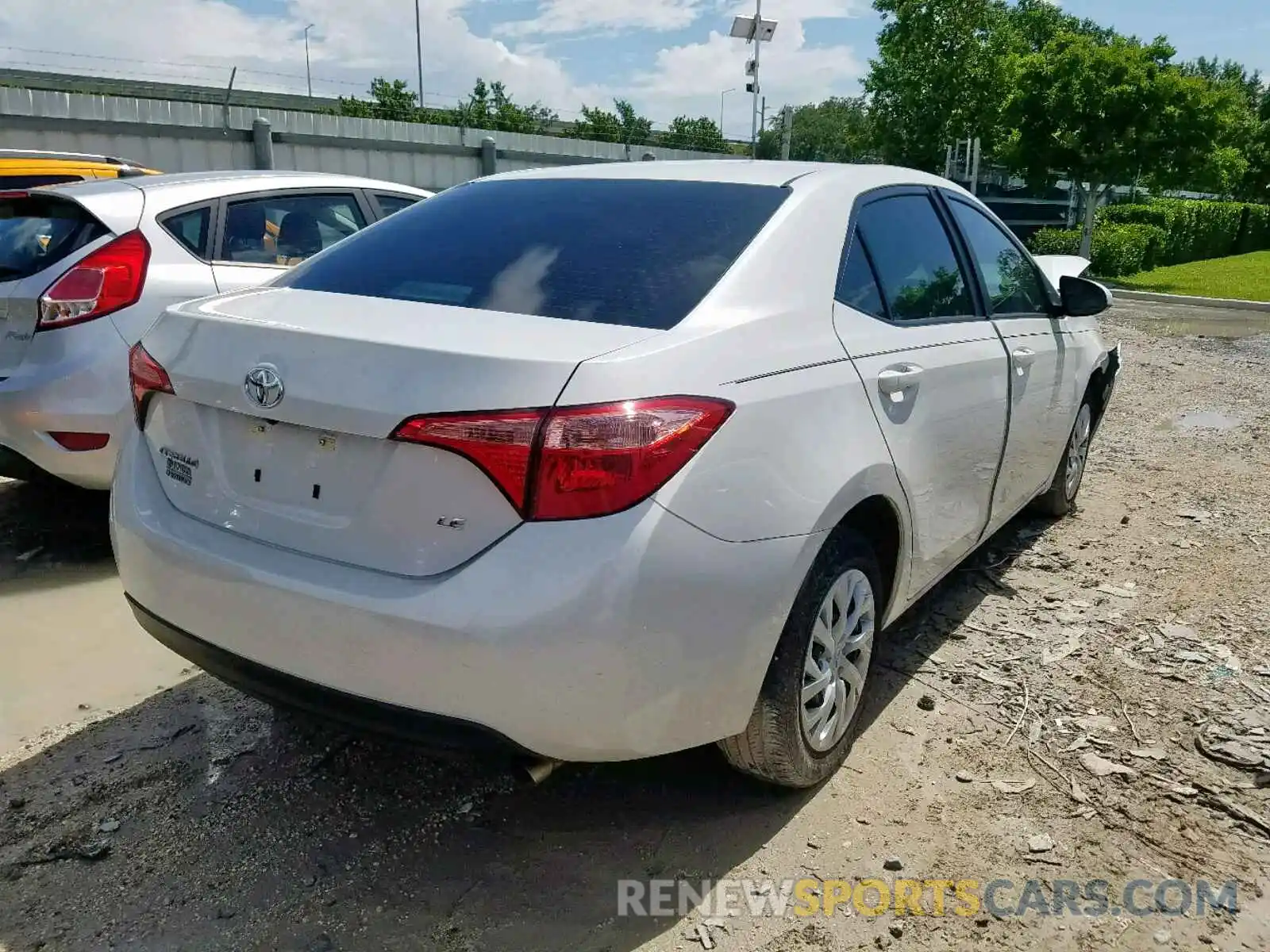 4 Photograph of a damaged car 5YFBURHE1KP904398 TOYOTA COROLLA 2019