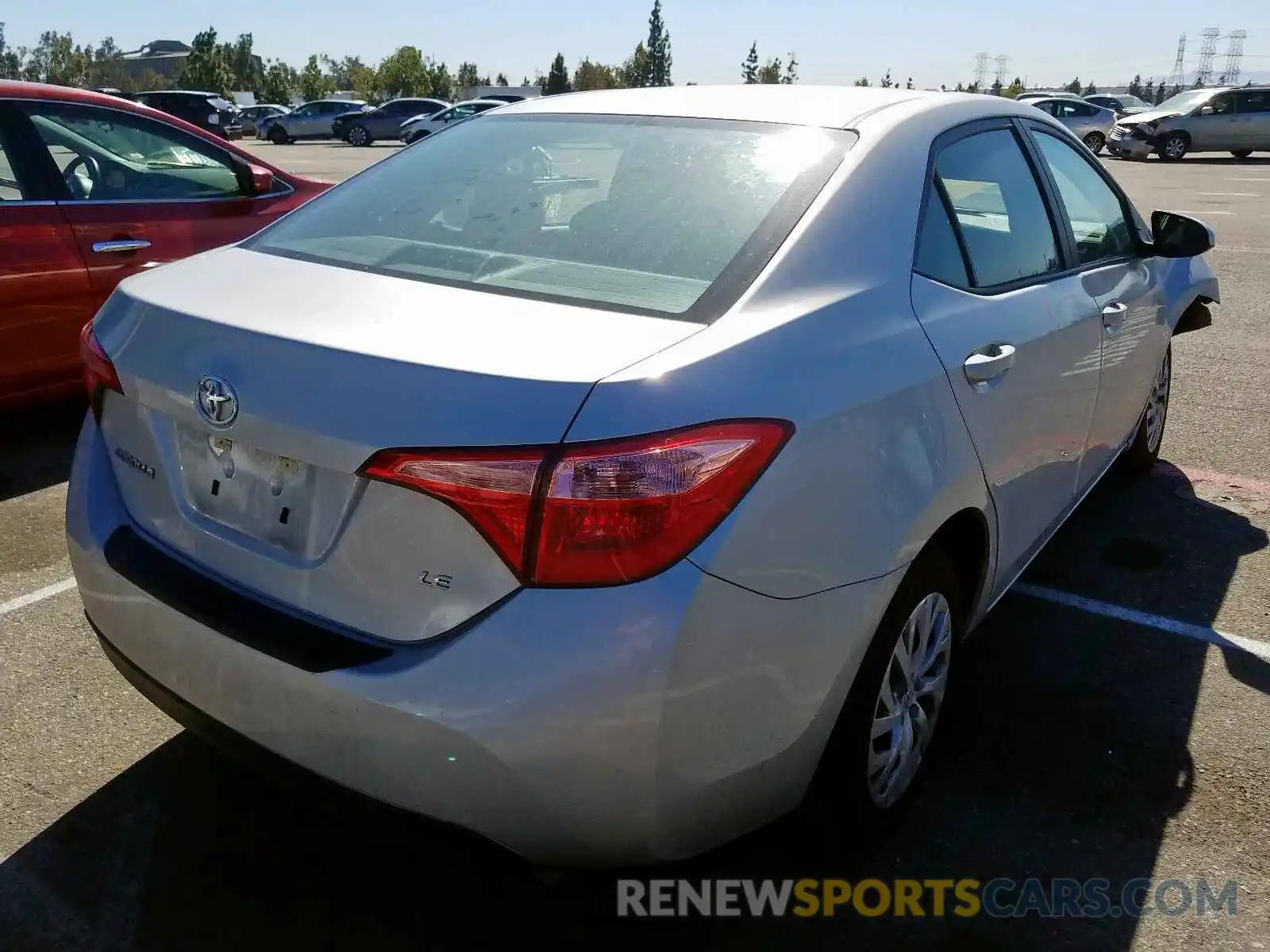 4 Photograph of a damaged car 5YFBURHE1KP906989 TOYOTA COROLLA 2019