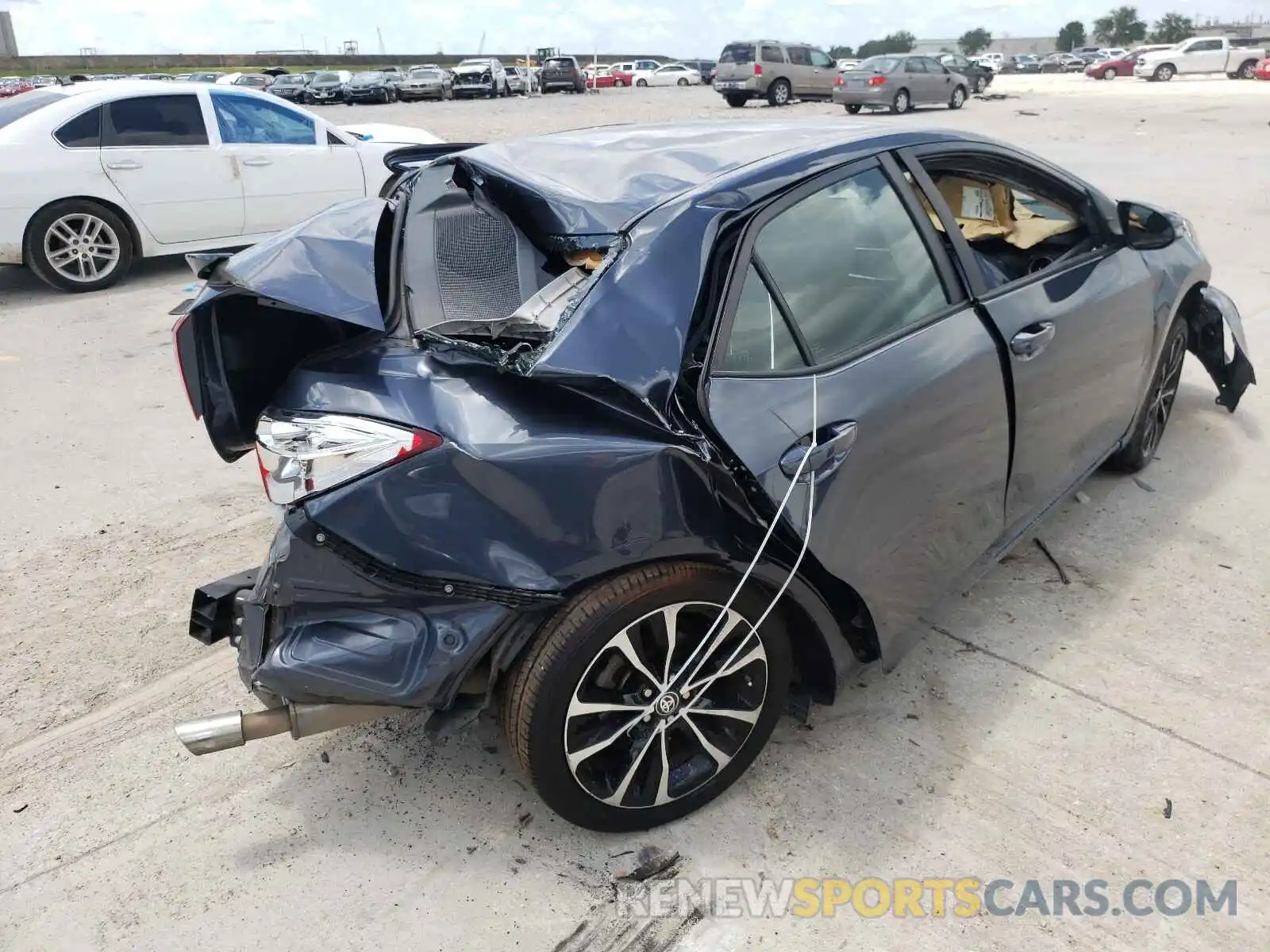 4 Photograph of a damaged car 5YFBURHE1KP910945 TOYOTA COROLLA 2019