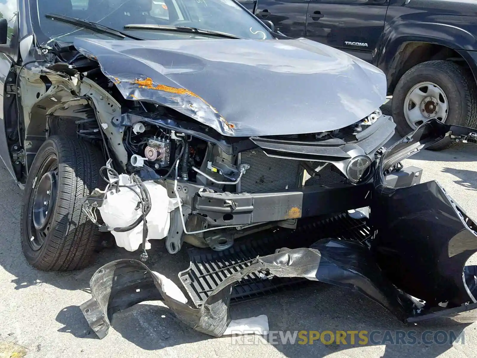 9 Photograph of a damaged car 5YFBURHE1KP921783 TOYOTA COROLLA 2019