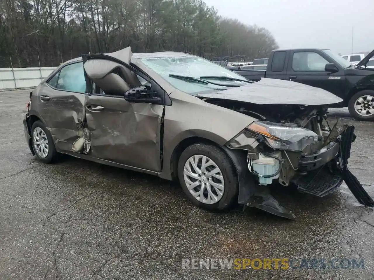 4 Photograph of a damaged car 5YFBURHE1KP922321 TOYOTA COROLLA 2019