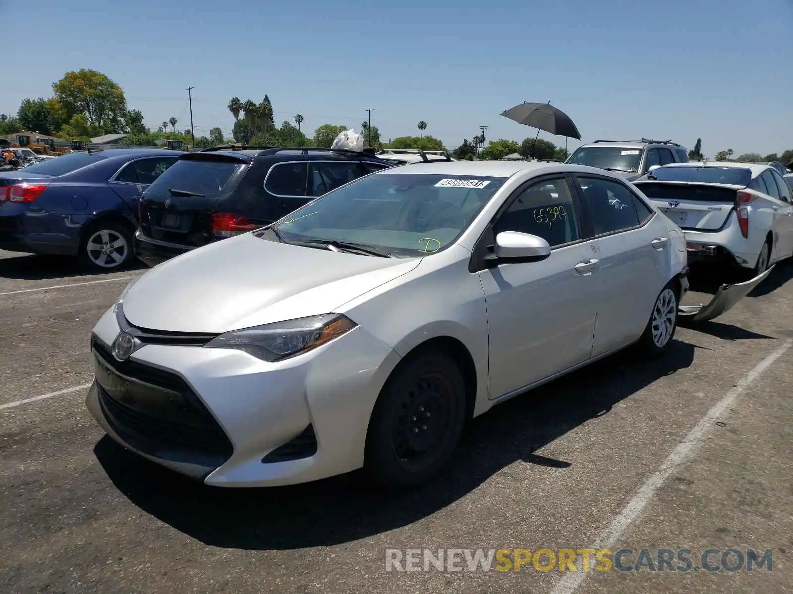 2 Photograph of a damaged car 5YFBURHE1KP936168 TOYOTA COROLLA 2019