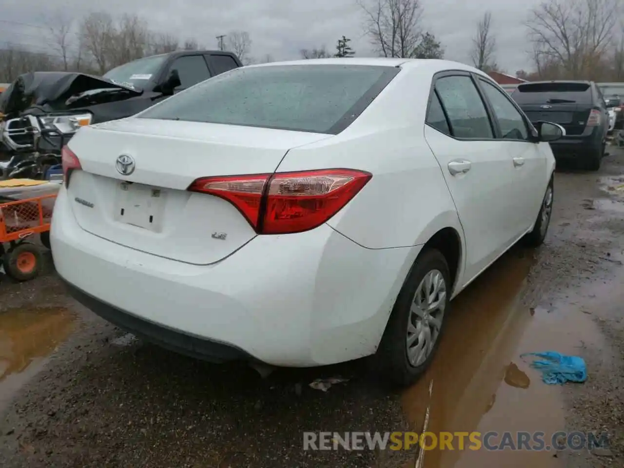 4 Photograph of a damaged car 5YFBURHE1KP936686 TOYOTA COROLLA 2019