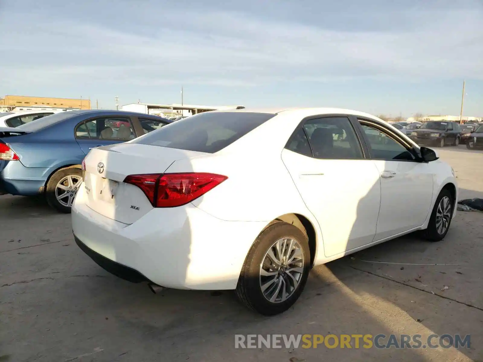 4 Photograph of a damaged car 5YFBURHE1KP943668 TOYOTA COROLLA 2019