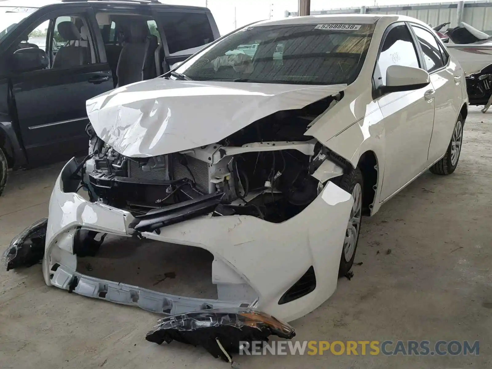 2 Photograph of a damaged car 5YFBURHE2KP863229 TOYOTA COROLLA 2019