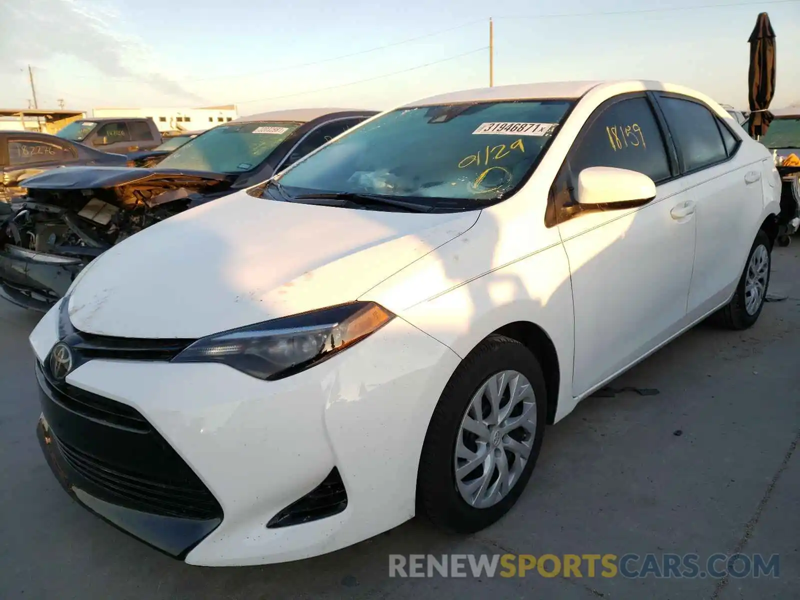 2 Photograph of a damaged car 5YFBURHE2KP864350 TOYOTA COROLLA 2019