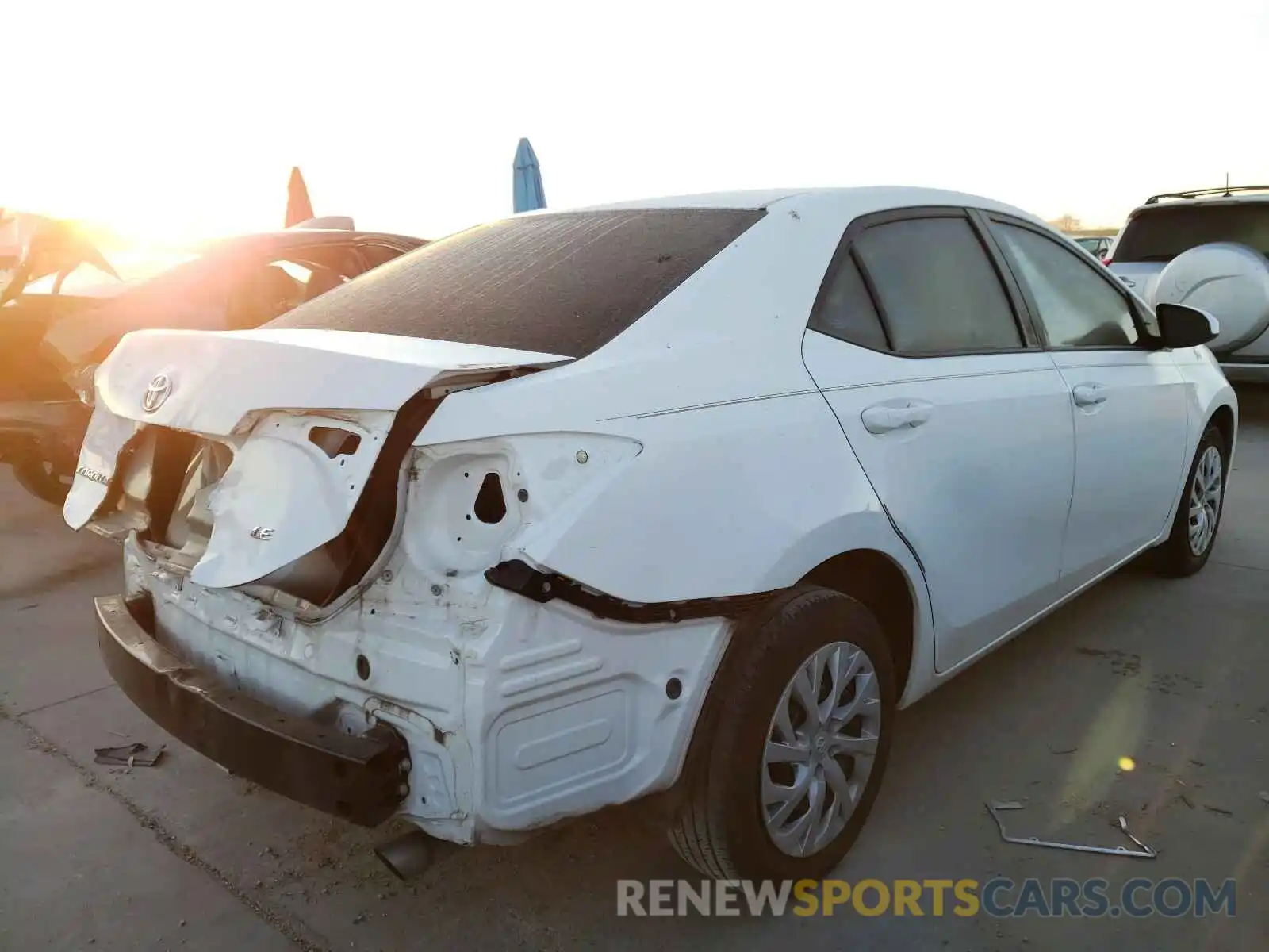 4 Photograph of a damaged car 5YFBURHE2KP864350 TOYOTA COROLLA 2019